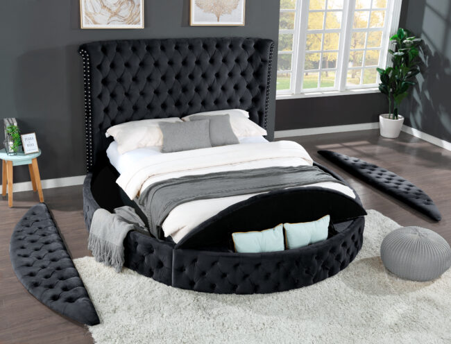 An upholstered four-piece bedroom set inside a bedroom