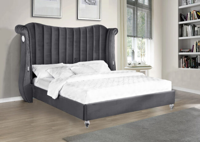 a Grey color bed with a white mattress