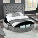 An upholstered four-piece bedroom set